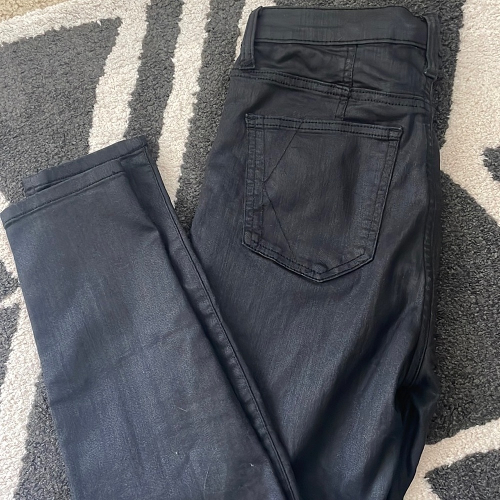 Black wax skinny jeans